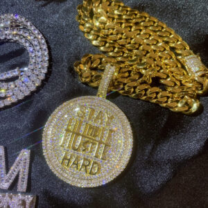 ICETOPLUXE gold pendant paired with Cuban link chain, luxury hip hop necklace.
