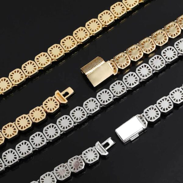 Backside of gold-plated and white tennis link chains, showing detailed craftsmanship, hip hop jewelry