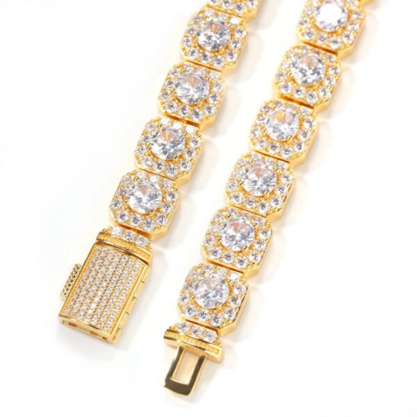 Detailed view of the clasp on 18K gold-plated iced out tennis link chain with cubic zirconia stones