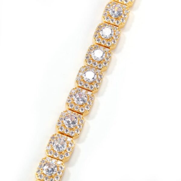 Close-up of the 18K gold-plated square cluster CZ stones on the iced out tennis link chain