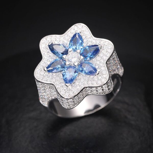 Front view of silver Klein blue moissanite flower ring, statement hip hop jewelry for men and women