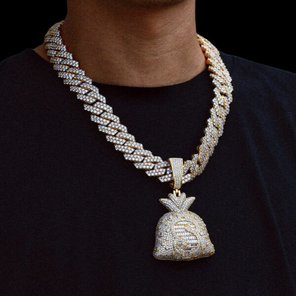 Model wearing iced out gold money bag pendant necklace with Miami Cuban chain, hip hop urban charm for men