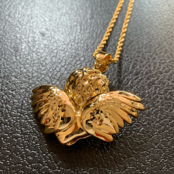 Back view of ICETOPLUXE gold plated blindfold angel pendant with CZ diamonds, hip hop jewelry for men, detailed craftsmanship