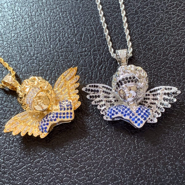 Side by side view of ICETOPLUXE gold and white blindfold angel pendants with CZ diamonds, perfect hip hop jewelry for men and women