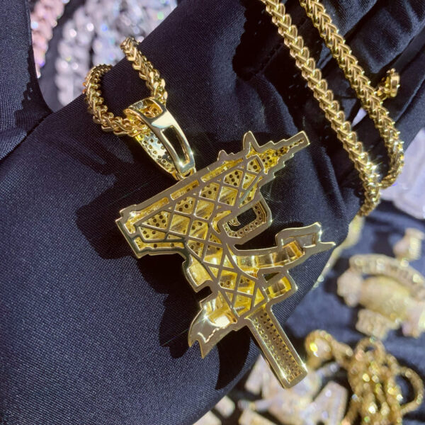 ICETOPLUXE back view of the iced out Uzi gun pendant, emphasizing high-quality craftsmanship and design