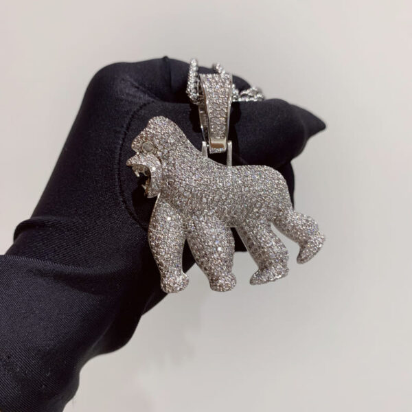 ICETOPLUXE detailed view of the iced out white roaring gorilla pendant, perfect for trendy jewelry lovers