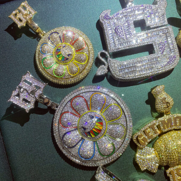 ICETOPLUXE white L and gold S daisy pendants with other pendants, trendy jewelry collection