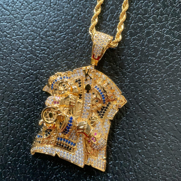 ICETOPLUXE gold-plated King Assassin pendant, sparkling with 5A CZ diamonds, a must-have hip hop accessory for men