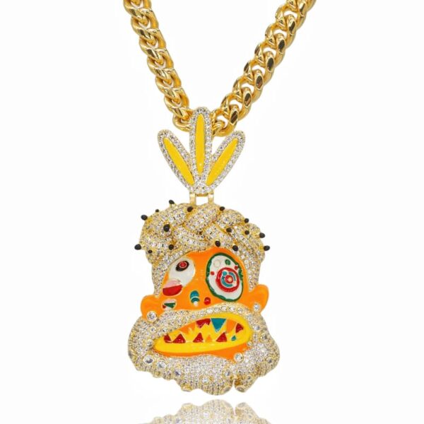 ICETOPLUXE gold pendant with glossy Cuban chain, featuring iced out bling and tribal chief design on white background