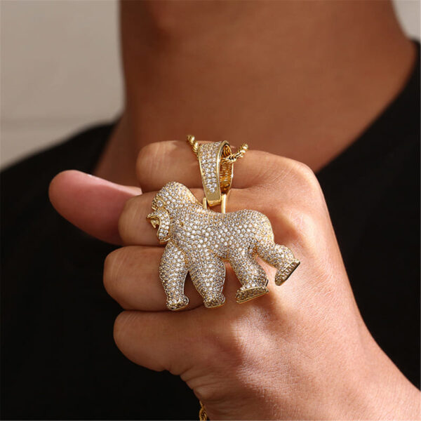 ICETOPLUXE model wearing the iced out gold roaring gorilla pendant, a perfect hip hop accessory