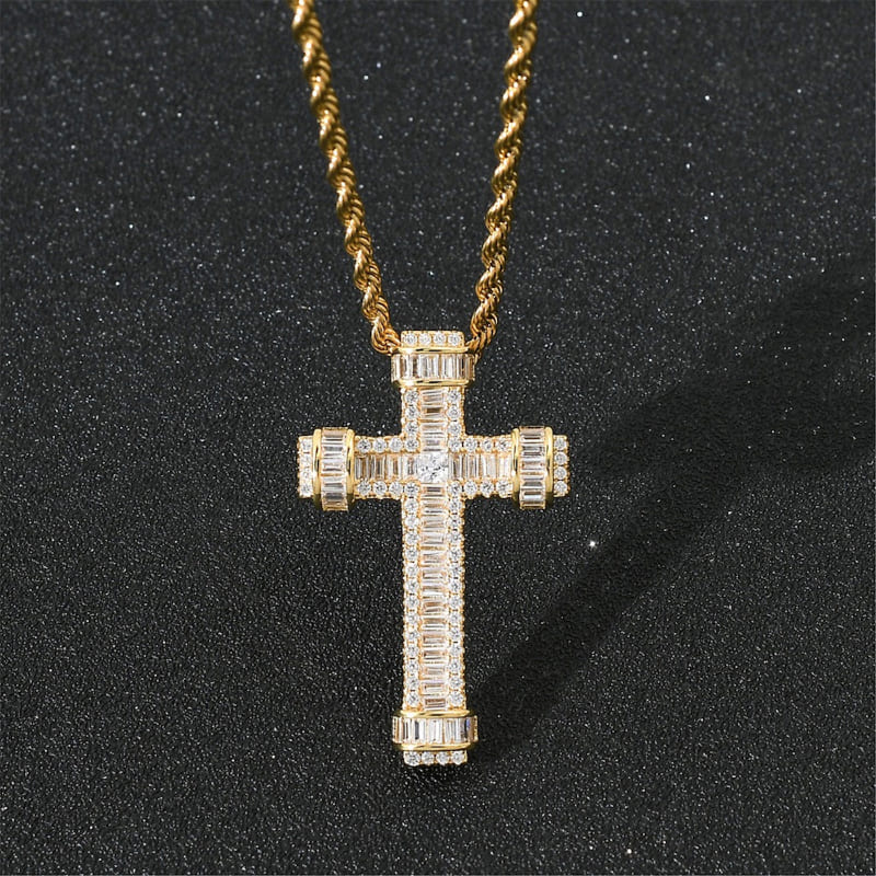 ICETOPLUXE close-up shot of gold scepter cross pendant, featuring full bling baguette CZ diamonds for stunning sparkle