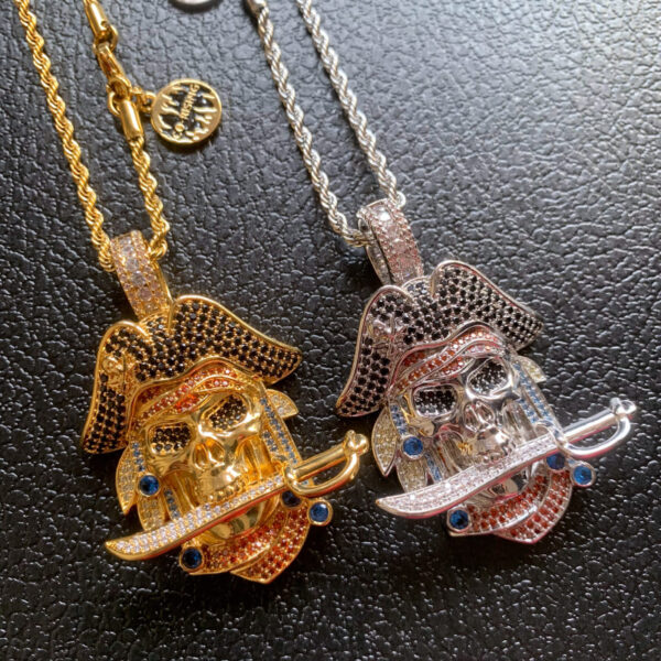 ICETOPLUXE gold and white pirate skull pendants, CZ diamond iced out, unique Hip Hop jewelry for Halloween