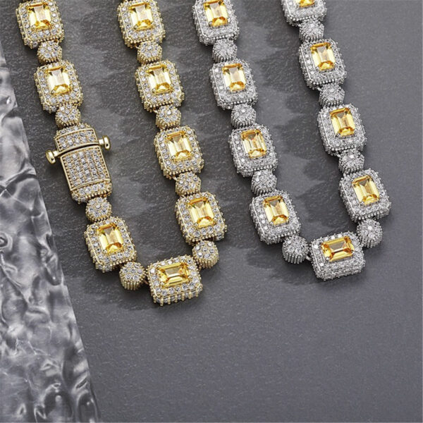 ICETOPLUXE detail view of gold and white baguette diamond tennis chains, stylish hip hop necklaces for men