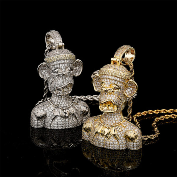 ICETOPLUXE gold and white big unruly monkey pendants displayed together, hip hop CZ diamond jewelry for men