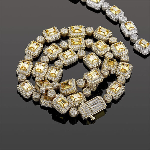 ICETOPLUXE close-up of men's gold baguette diamond tennis chain, bling necklace perfect for hip hop fashion