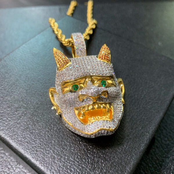 ICETOPLUXE Gold Yaksha Ghost pendant side profile, iced out with CZ diamonds, Halloween and hip hop style necklace for men