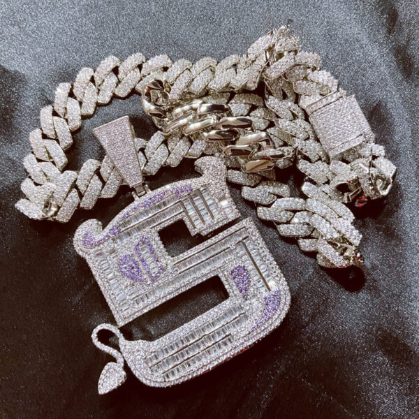 ICETOPLUXE stylish S letter iced out pendant paired with Cuban chain, perfect for any hip hop outfit