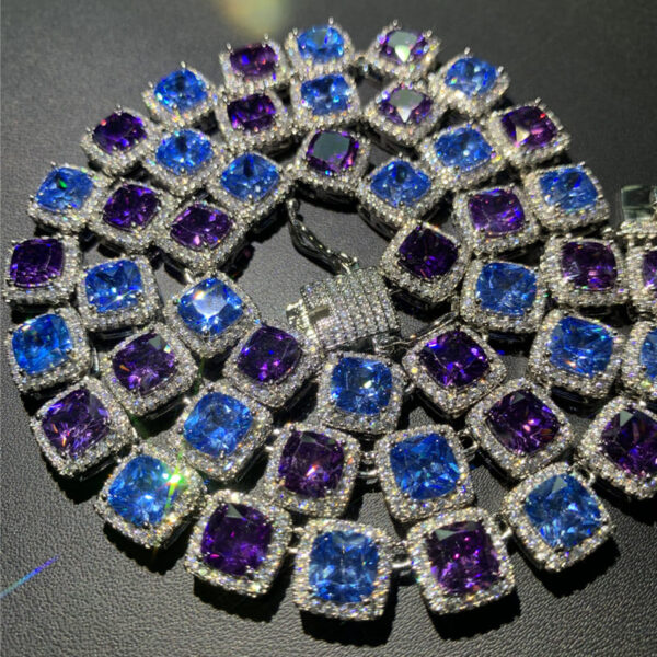 ICETOPLUXE iced out necklace sparkling in natural light, showcasing its vibrant blue and purple zircon stones