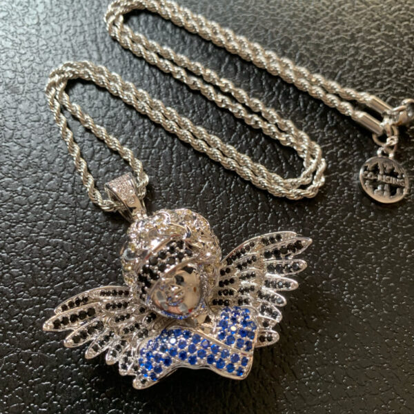 Front view of ICETOPLUXE white blindfold angel pendant with black and white CZ diamonds, perfect for men’s hip hop jewelry