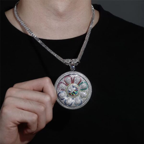 ICETOPLUXE white spin-up daisy pendant worn with tennis chain on model, stylish hip hop jewelry