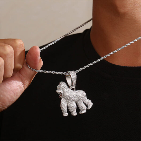 ICETOPLUXE model showcasing the iced out white roaring gorilla pendant, enhancing hip hop style