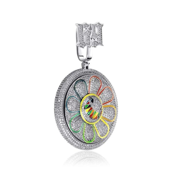 ICETOPLUXE white rotating daisy pendant side view on white background, hip hop jewelry for men and women