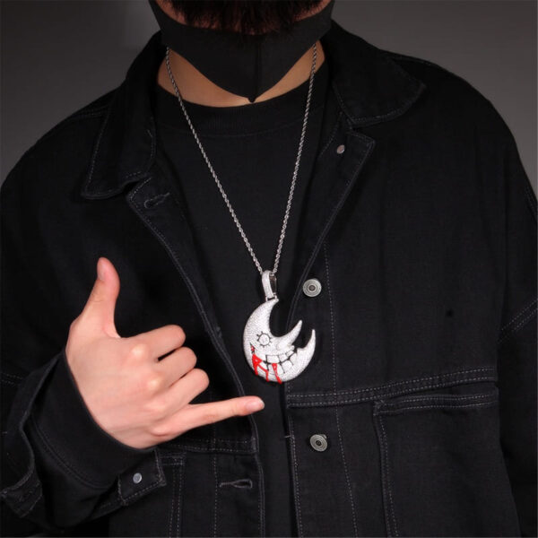 Iced out white gold crescent moon pendant on model, hip hop jewelry for men