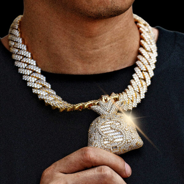 Hip hop style model wearing gold money bag pendant necklace with Miami Cuban chain, iced out urban jewelry for men