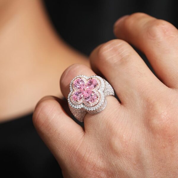 White moissanite flower iced out ring worn by model, stylish hip hop jewelry for women