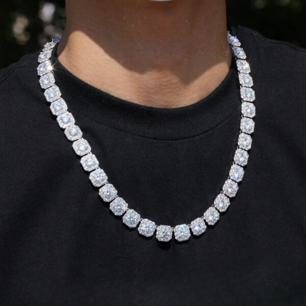 Model wearing iced out white tennis link chain with cubic zirconia, 20-inch length, hip hop jewelry for men and women