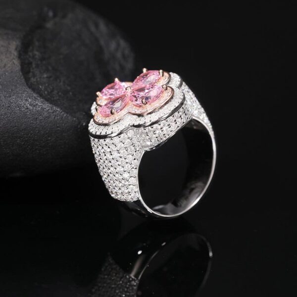 Side view of silver moissanite flower iced out ring, hip hop jewelry for women, statement ring