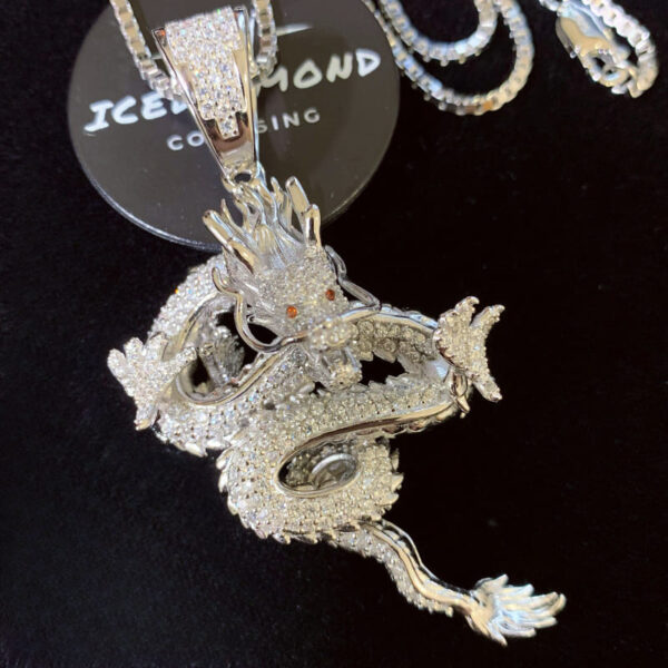 Close-up of ICETOPLUXE sterling silver dragon pendant with luxurious 18K gold plating, perfect for men’s hip hop necklaces.